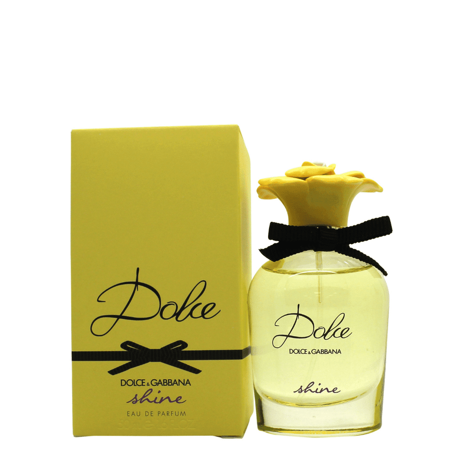 Damparfym från Dolce & Gabbana. Flaskan är guldig med svart-text. Knoppen är formad som en ros.